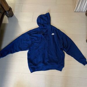 Electric blue lace up Nike hoodie.